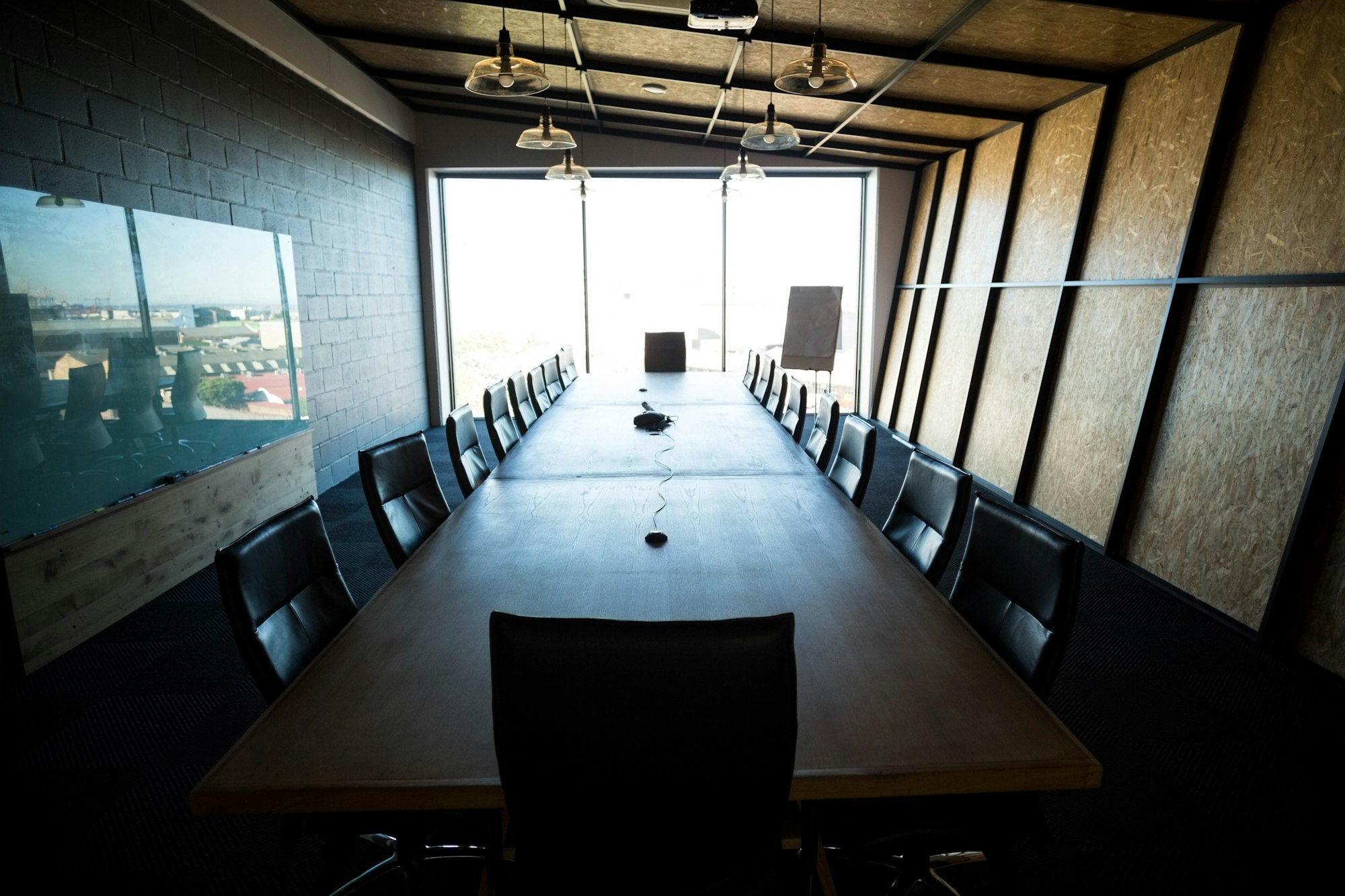 An empty modern conference room and conference table in office